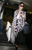 CU-Olivia Munn arrives at LAX-08