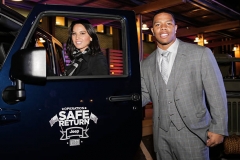 FORT BELVOIR, VA - FEBRUARY 6: Superbowl champion Baltimore Raven Ray Rice (L) and actress Olivia Munn pose for a picture with the Jeep Wrangler Freedom Edition at the launch event for Jeep Operation Safe Return at the USO Warrior & Family Center on February 6, 2013 in Fort Belvoir, VA. (Photo by Brendan Hoffman/Getty Images for Jeep)