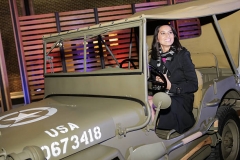 FORT BELVOIR, VA - FEBRUARY 6: Actress Olivia Munn sits in a 1941 Willys MB at the launch event for Jeep Operation Safe Return at the USO Warrior & Family Center on February 6, 2013 in Fort Belvoir, VA. (Photo by Brendan Hoffman/Getty Images for Jeep)