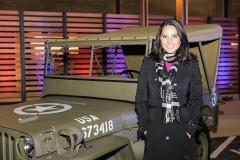 FORT BELVOIR, VA - FEBRUARY 6: Actress Olivia Munn poses in front of a 1941 Willys MB at the launch event for Jeep Operation Safe Return at the USO Warrior & Family Center on February 6, 2013 in Fort Belvoir, VA. (Photo by Brendan Hoffman/Getty Images for Jeep)