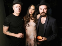 LOS ANGELES, CA - NOVEMBER 15:  (L-R) Herring & Herring Co-Founder Jesper Carlsen, Olivia Munn and Herring & Herring Co-Founder Dimitri Scheblanov attend the Herring & Herring Issue 5 Launch Party sponsored by Absolut Elyx on November 15, 2018 in Los Angeles, California.  (Photo by Gabriel Olsen/Getty Images for Herring & Herring and Absolut Elyx)
