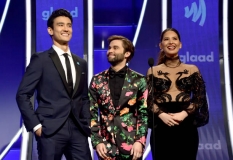 BEVERLY HILLS, CALIFORNIA - MARCH 28: (L-R) Alex Landi, Jake Borelli, and Olivia Munn speak onstage during the 30th Annual GLAAD Media Awards Los Angeles at The Beverly Hilton Hotel on March 28, 2019 in Beverly Hills, California. (Photo by Matt Winkelmeyer/Getty Images for GLAAD)