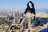 giant_olivia_munn_in_city_by_docop-d4b9hes