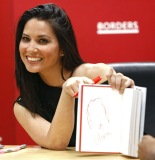 Olivia Munn promotes