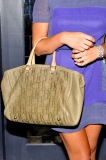 NEW YORK, NY - SEPTEMBER 11:  Olivia Munn (purse detail) has dinner at Abe & Arthur's on September 11, 2011 in New York City.  (Photo by Marc Stamas/WireImage)