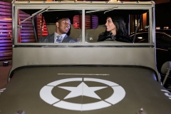 FORT BELVOIR, VA - FEBRUARY 6: Superbowl champion Baltimore Raven Ray Rice (L) and actress Olivia Munn sit in a 1941 Willys MB at the launch event for Jeep Operation Safe Return at the USO Warrior & Family Center on February 6, 2013 in Fort Belvoir, Virginia. (Photo by Brendan Hoffman/Getty Images for Jeep)