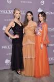 CULVER CITY, CA - NOVEMBER 10:  (L-R) Baby2Baby Co-President Kelly Sawyer Patricof, Olivia Munn, Baby2Baby Co-President Norah Weinstein pose at the 2018 Baby2Baby Gala Presented by Paul Mitchell at 3LABS on November 10, 2018 in Culver City, California.  (Photo by Stefanie Keenan/Getty Images for Baby2Baby)