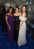 SANTA MONICA, CALIFORNIA - JANUARY 13: Regina King, Linda Cardellini and Olivia Munn at The 24th Annual Critics' Choice Awards at Barker Hangar on January 13, 2019 in Santa Monica, California. (Photo by Jeff Kravitz/FilmMagic)