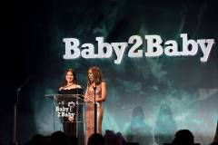 WEST HOLLYWOOD, CALIFORNIA - NOVEMBER 08: (L-R) Olivia Munn and Kerry Washington speak onstage during the 2025 Baby2Baby Gala Presented By Paul Mitchell at Pacific Design Center on November 08, 2025 in West Hollywood, California. (Photo by Emma McIntyre/Getty Images for Baby2Baby)