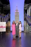 NEW YORK, NEW YORK - OCTOBER 01: (L-R) Elizabeth Hurley, William P. Lauder, and Olivia Munn light the Empire State Building pink with a scrolling ribbon in the mast to honor the Este? Lauder companies' Breast Cancer Campaign and Breast Cancer Awareness Month on October 01, 2025 in New York City. (Photo by John Nacion/Getty Images for Empire State Realty Trust)