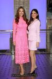 NEW YORK, NEW YORK - OCTOBER 01: (L-R) Elizabeth Hurley, Global Ambassador, The Est?e Lauder Companies? Breast Cancer Campaign, and Olivia Munn light the Empire State Building pink in honor of The Est?e Lauder Companies' Breast Cancer Campaign on October 01, 2025 in New York City. (Photo by Kevin Mazur/Getty Images for The Est?e Lauder Companies)