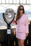 NEW YORK, NEW YORK - OCTOBER 01: Olivia Munn lights the Empire State Building pink in honor of The Est?e Lauder Companies' Breast Cancer Campaign on October 01, 2025 in New York City. (Photo by Kevin Mazur/Getty Images for The Est?e Lauder Companies)