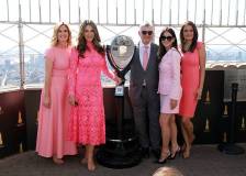 NEW YORK, NEW YORK - OCTOBER 01: (L-R) Mary Alice Haney, Elizabeth Hurley, Global Ambassador, The Est?e Lauder Companies? Breast Cancer Campaign, William P. Lauder, Executive Chairman, The Est?e Lauder Companies Inc., Olivia Munn, and Tha?s Aliabadi light the Empire State Building pink in honor of The Est?e Lauder Companies' Breast Cancer Campaign on October 01, 2025 in New York City. (Photo by Kevin Mazur/Getty Images for The Est?e Lauder Companies)