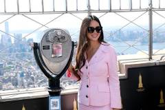 NEW YORK, NEW YORK - OCTOBER 01: Olivia Munn lights the Empire State Building pink in honor of The Est?e Lauder Companies' Breast Cancer Campaign on October 01, 2025 in New York City. (Photo by Kevin Mazur/Getty Images for The Est?e Lauder Companies)