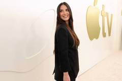 SANTA MONICA, CALIFORNIA - FEBRUARY 03: Olivia Munn, from the second season of Apple's series ?Your Friends & Neighbors,? at the Apple TV Press Day at the Barker Hangar on February 03, 2026 in Santa Monica, California. The star-studded event highlighted a stellar lineup of original series and films coming to Apple TV in 2026. (Photo by Stewart Cook/Apple TV  via Getty Images)