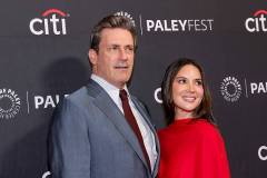 HOLLYWOOD, CALIFORNIA - APRIL 11: (L-R) Jon Hamm and Olivia Munn attend Apple TV's "Your Friends and Neighbors" during 2026 PaleyFest LA at Dolby Theatre on April 11, 2026 in Hollywood, California. (Photo by Julian Hamilton/WireImage)